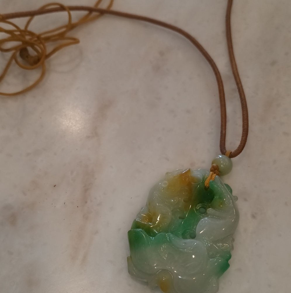 Natural Emerald Lotus Leaf Pendant with White Background Myanmar and Hemeimei Ja